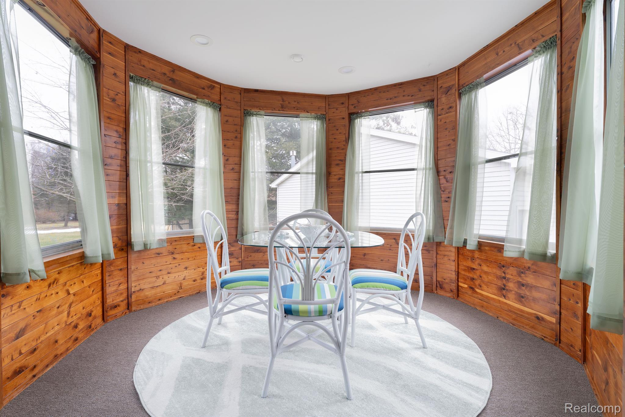 6884 West Lange Road Fowlerville, MI 48836 - Photo 16 of 59 THIS 3 SEASON ROOM IS CEDAR....