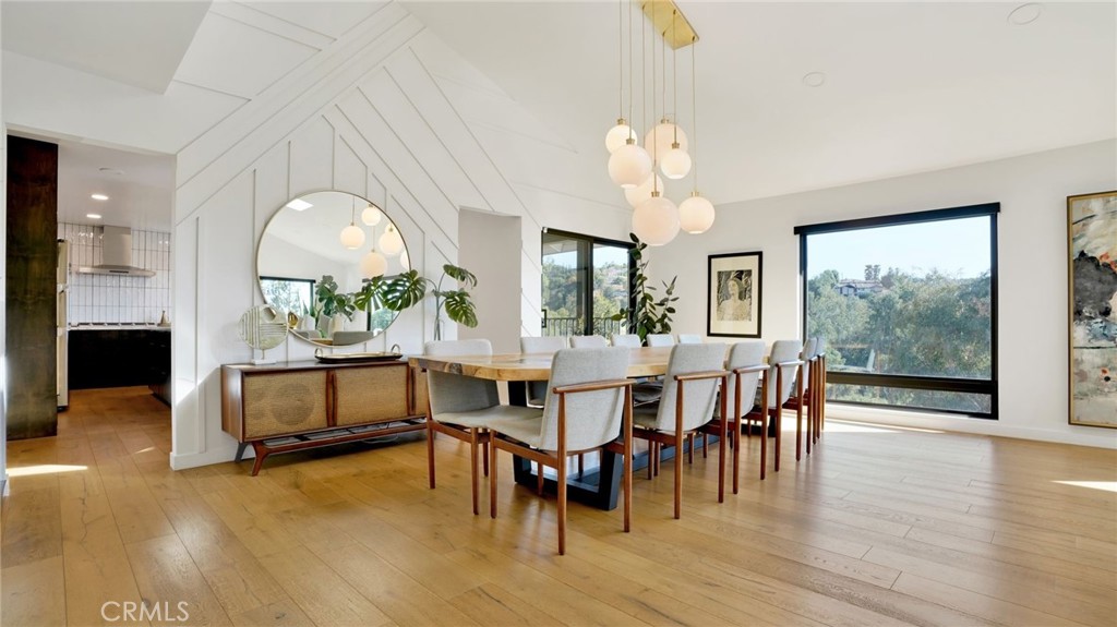 1574 East Dexter Street Covina, CA 91724 - Photo 16 of 56 a view of a dining room with furniture window and wooden floor