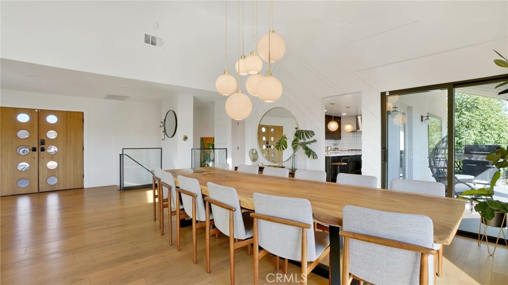 1574 East Dexter Street Covina, CA 91724 - Photo 17 of 56 a view of a dining room with furniture and wooden floor