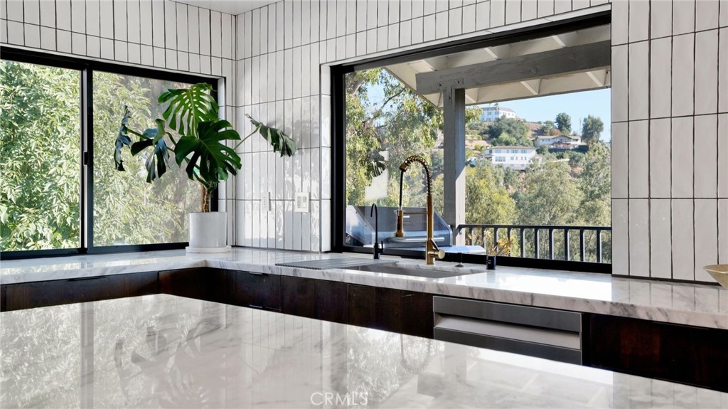 1574 East Dexter Street Covina, CA 91724 - Photo 21 of 56 a living room filled with furniture and a large window