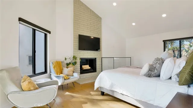 a bedroom with a bed and window