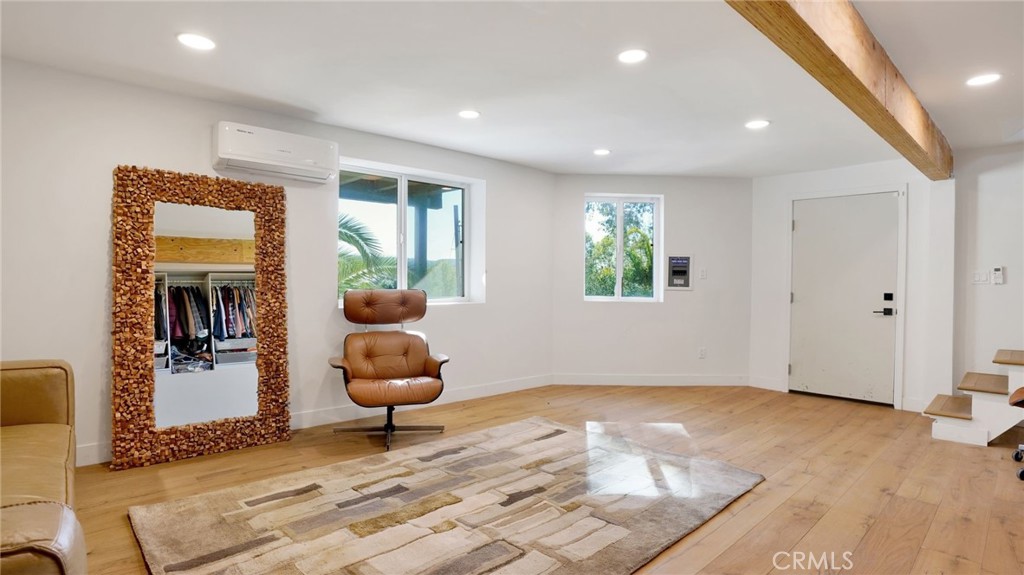 1574 East Dexter Street Covina, CA 91724 - Photo 28 of 56 a living room with furniture and a rug