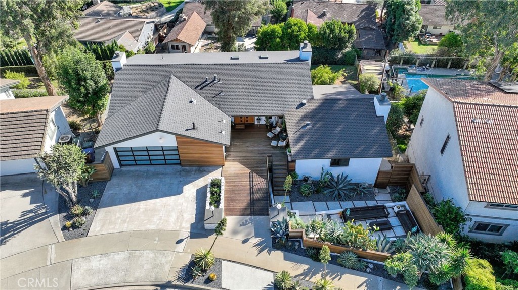 1574 East Dexter Street Covina, CA 91724 - Photo 3 of 56 an aerial view of multiple houses with yard