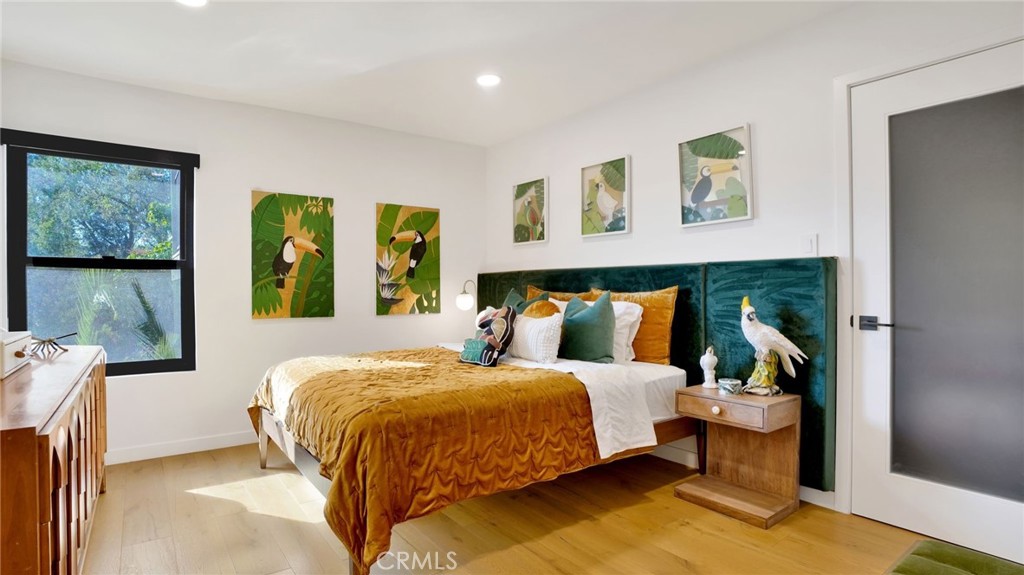 1574 East Dexter Street Covina, CA 91724 - Photo 38 of 56 a bedroom with a bed and window