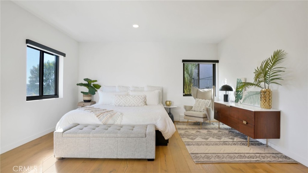 1574 East Dexter Street Covina, CA 91724 - Photo 41 of 56 a bedroom with a bed and a couch