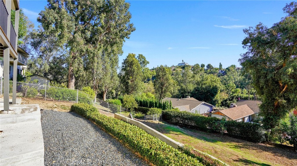 1574 East Dexter Street Covina, CA 91724 - Photo 46 of 56 a view of a garden with a houses