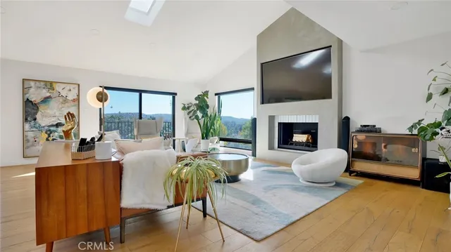 a view of a balcony with wooden fence and floor