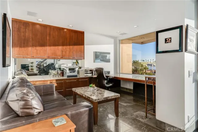 a view of entryway and hall with dining area