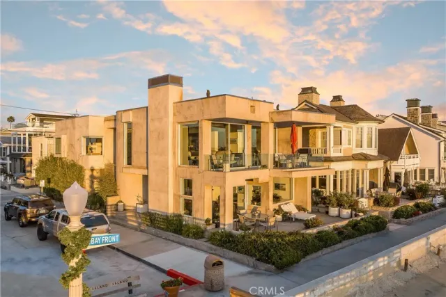 a front view of a building with a lot of windows