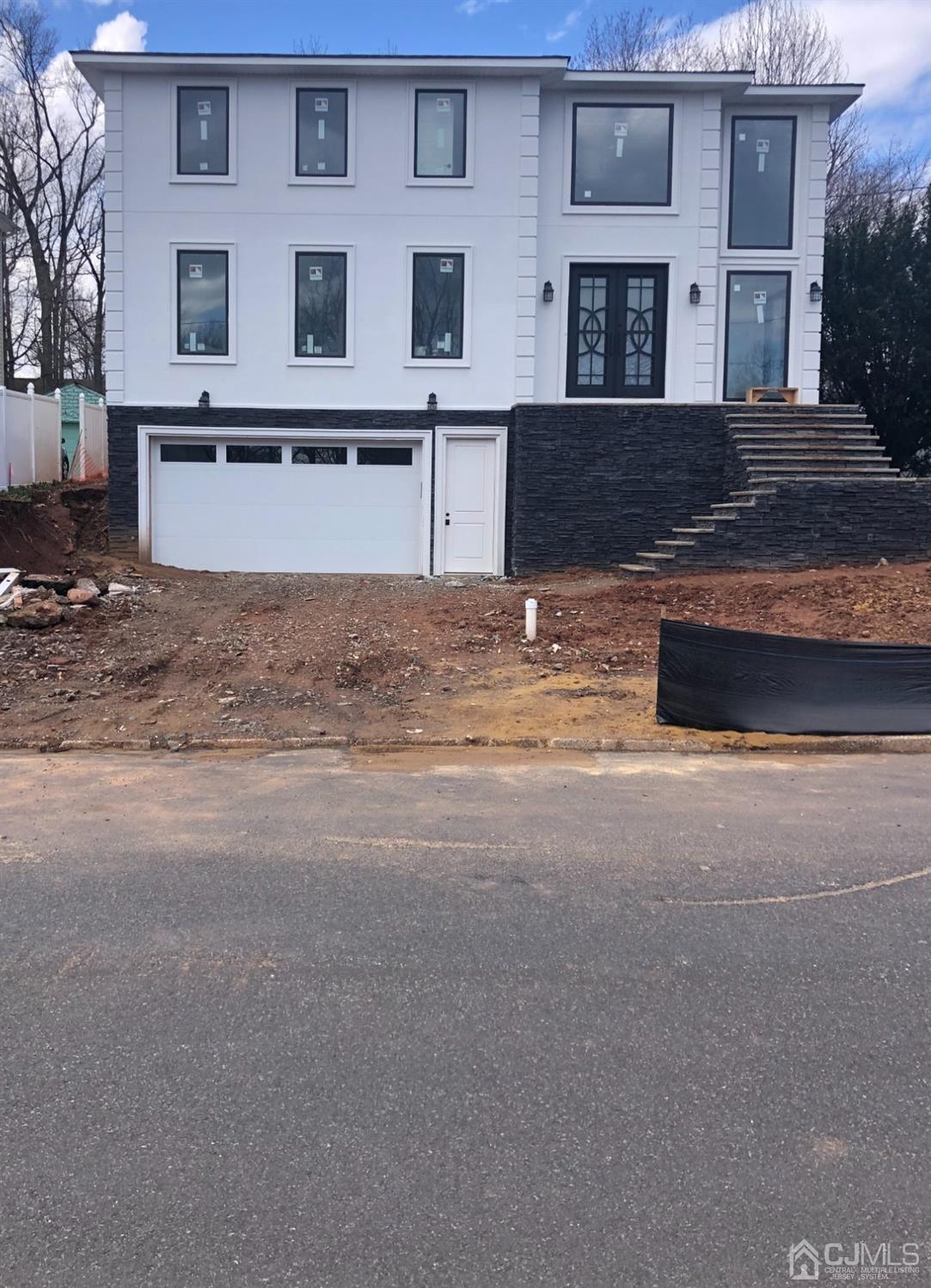 37 Henry Street Edison, NJ 08820 - Photo 1 of 1 a front view of a house with a yard