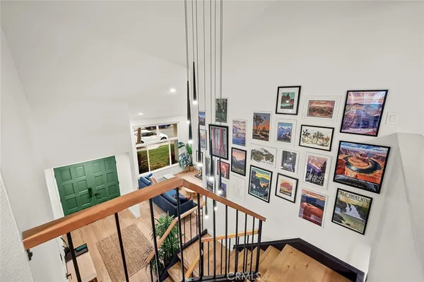 a view of a livingroom with workspace and a couch