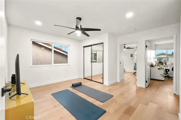a bathroom with a double vanity sink toilet and shower