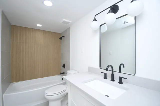 a bathroom with a white bath tub
