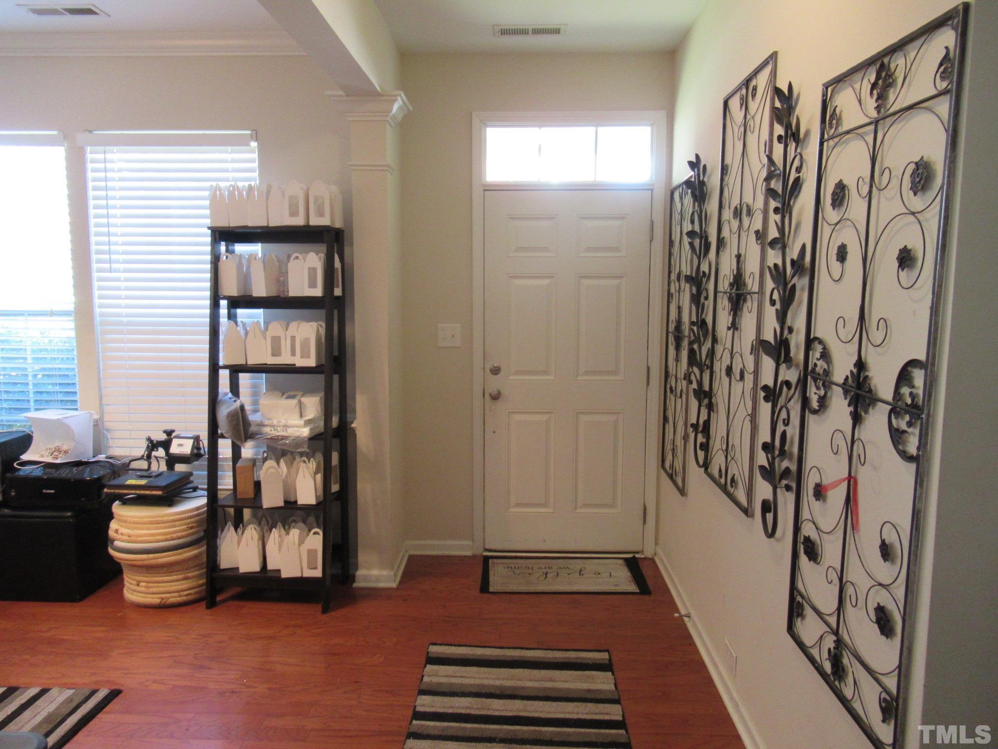 541 Ashgreen Court Rolesville, NC 27571 - Photo 2 of 15 a view of an entryway with wooden floor