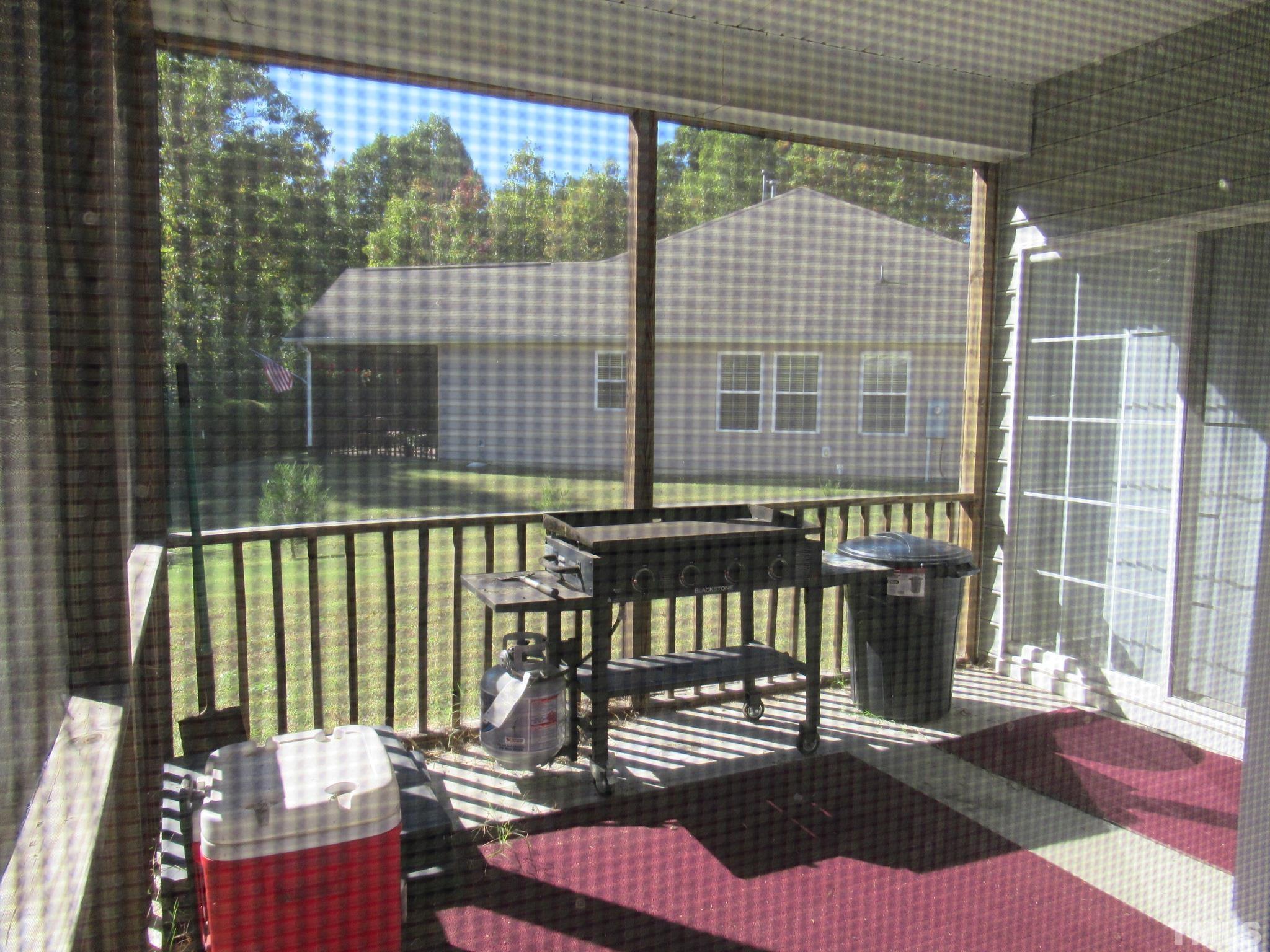 541 Ashgreen Court Rolesville, NC 27571 - Photo 13 of 15 a view of a balcony with a potted plant