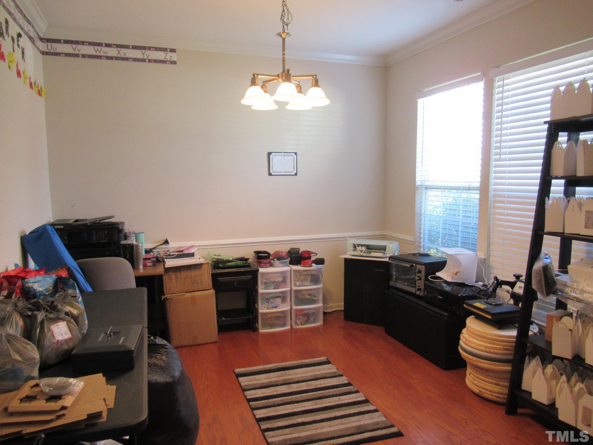 541 Ashgreen Court Rolesville, NC 27571 - Photo 3 of 15 a very nice looking room with many windows