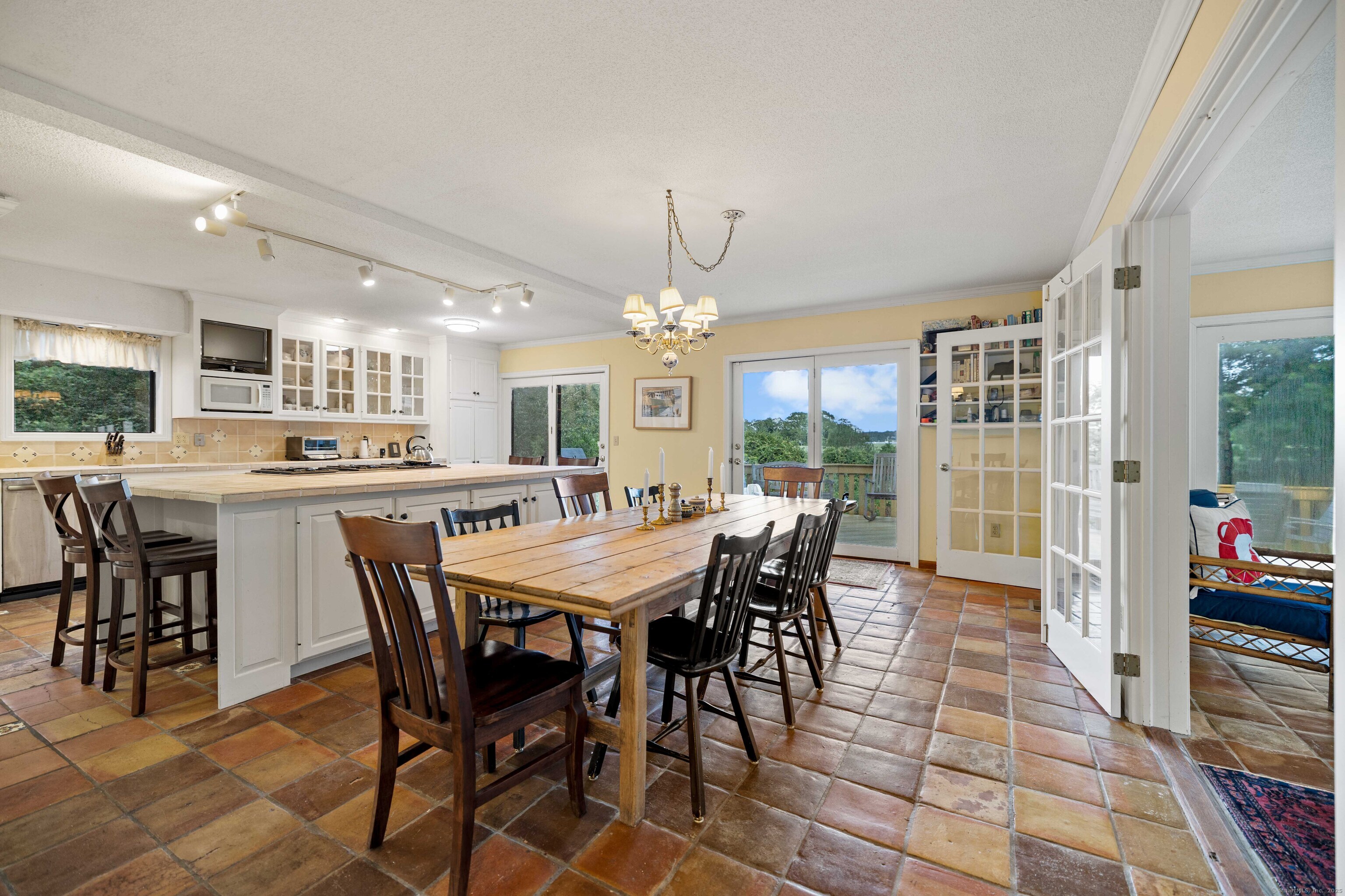 96 Ayers Point Road Old Saybrook, CT 06475 - Photo 1 of 39 a view of a dining room with furniture