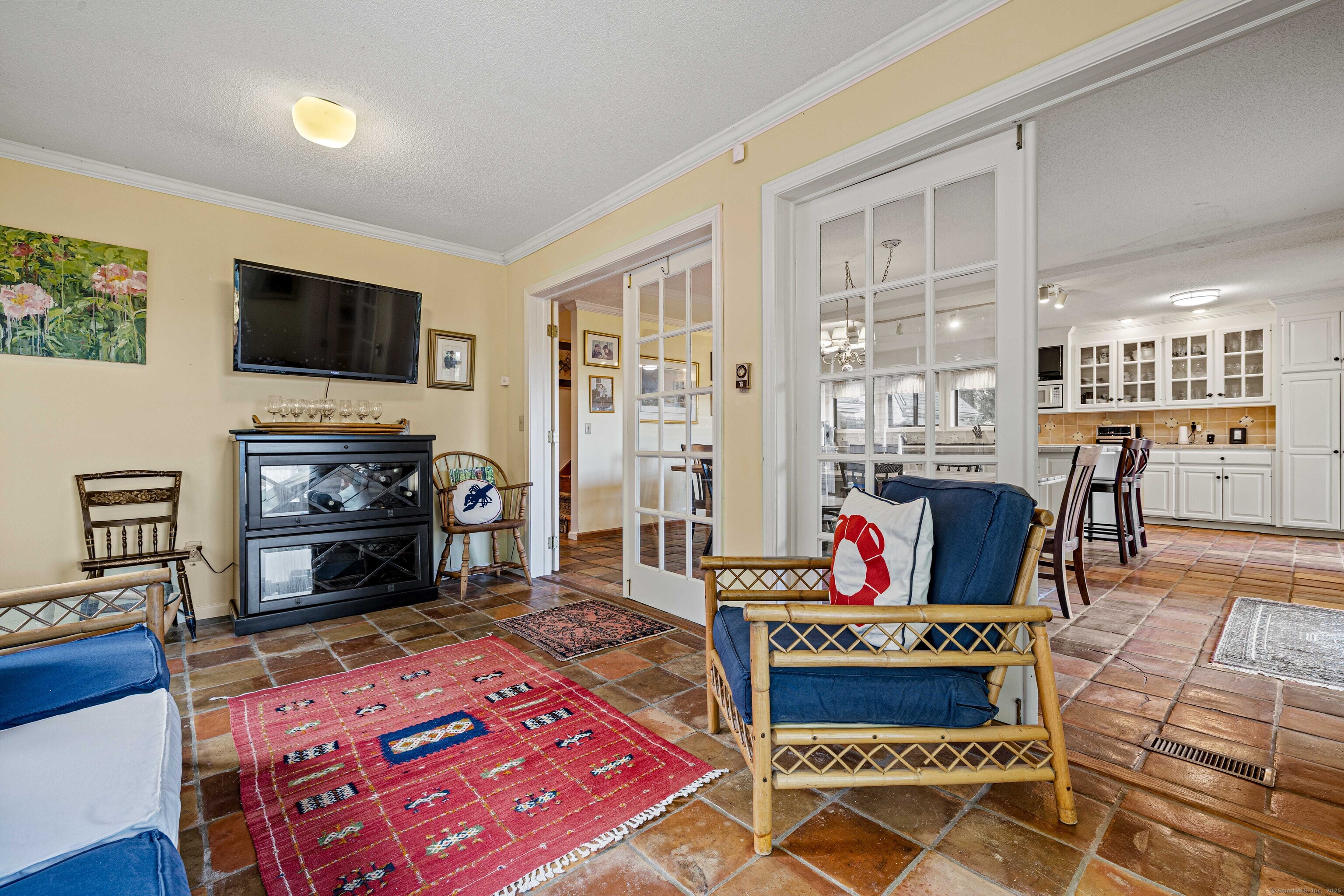 96 Ayers Point Road Old Saybrook, CT 06475 - Photo 16 of 39 a living room with furniture fireplace and flat screen tv