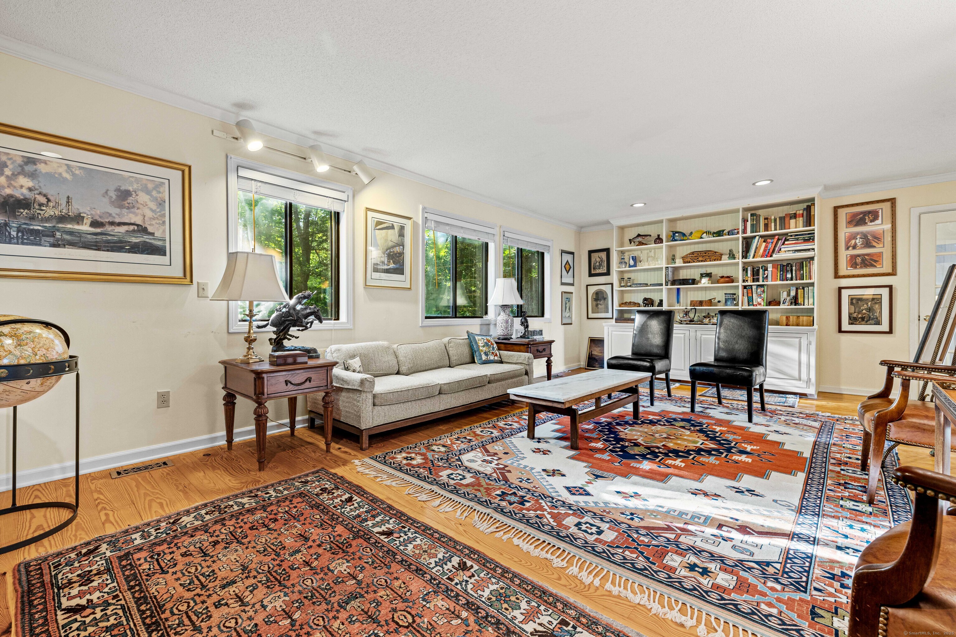 96 Ayers Point Road Old Saybrook, CT 06475 - Photo 17 of 39 a living room with furniture and a rug