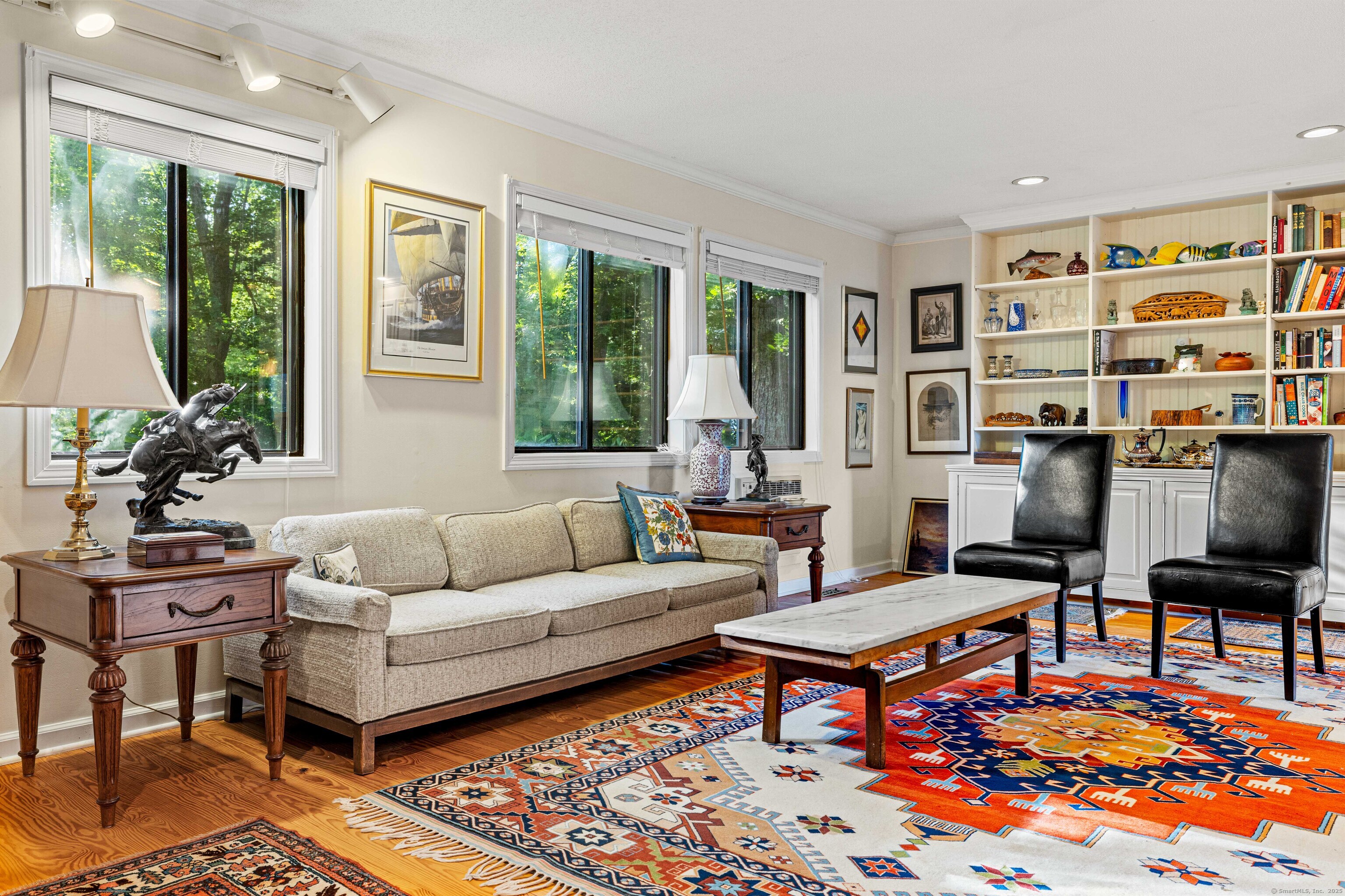 96 Ayers Point Road Old Saybrook, CT 06475 - Photo 18 of 39 a living room with furniture a rug and a large window