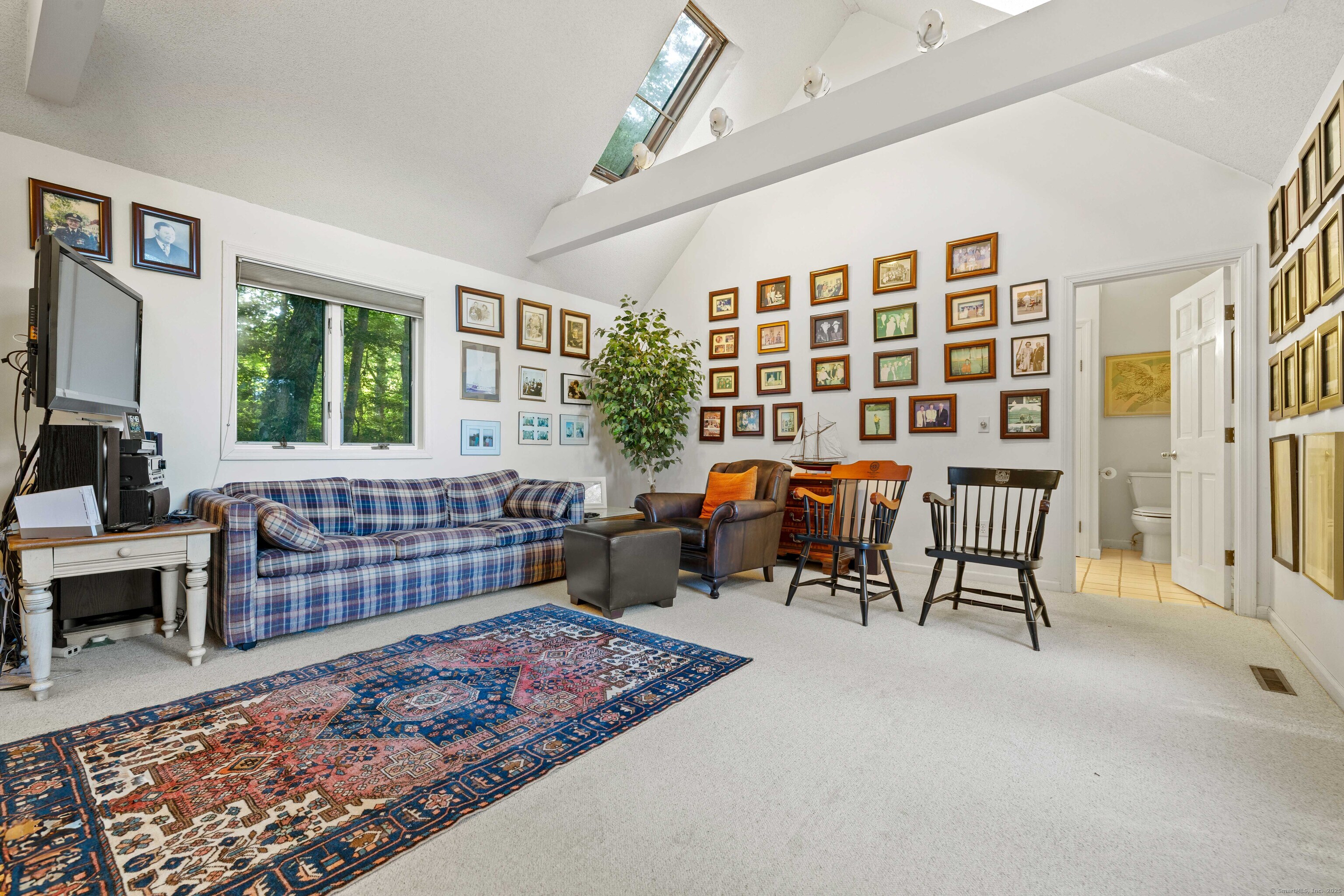 96 Ayers Point Road Old Saybrook, CT 06475 - Photo 25 of 39 a bed room with furniture and a window