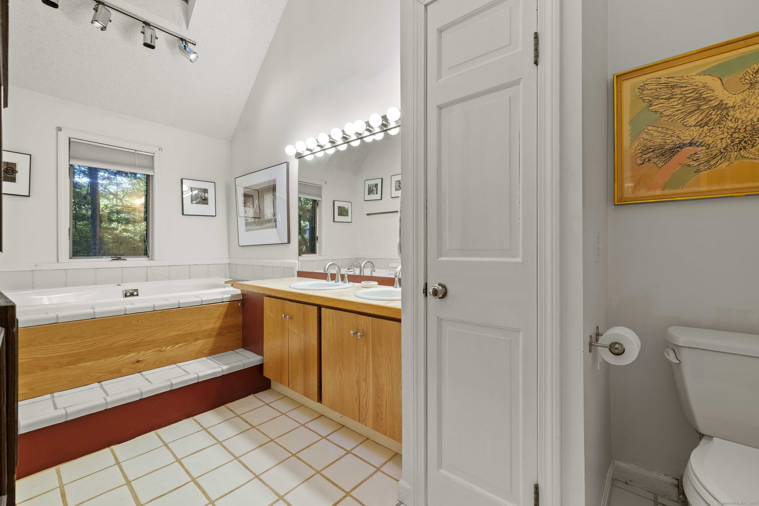 96 Ayers Point Road Old Saybrook, CT 06475 - Photo 29 of 39 a large bathroom with a tub and shower