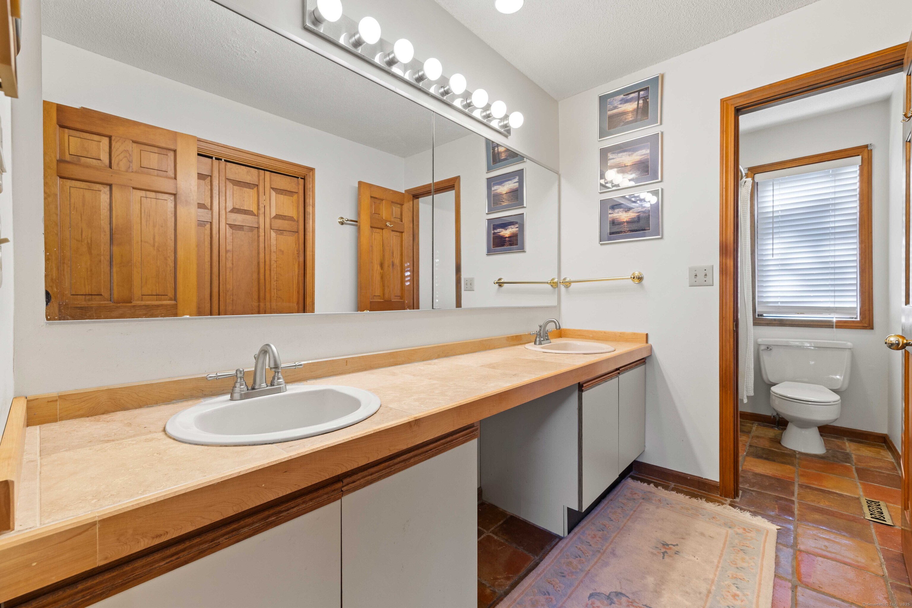 96 Ayers Point Road Old Saybrook, CT 06475 - Photo 39 of 39 a bathroom with a sink double vanity and a toilet