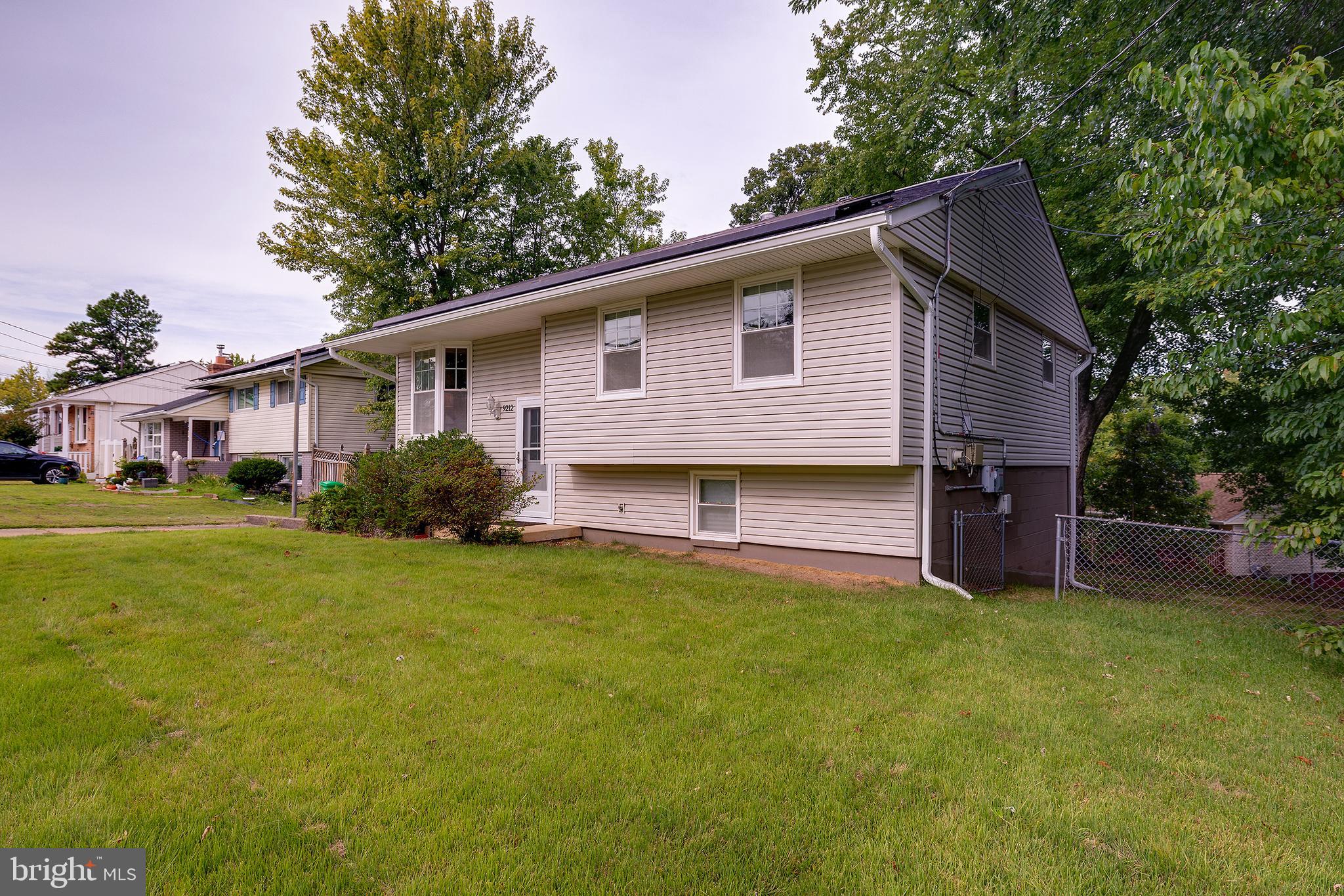 a house view with a garden space