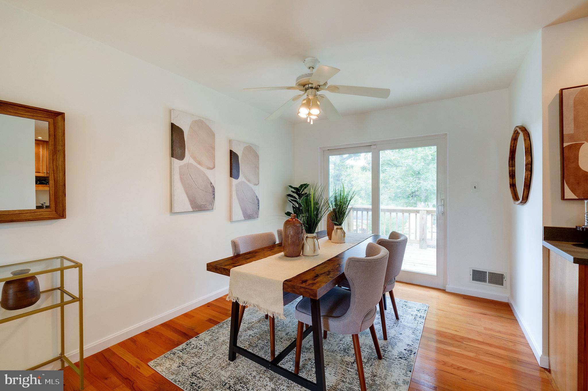 9212 Morley Road Lanham, MD 20706 - Photo 13 of 64 a dining room with furniture and window