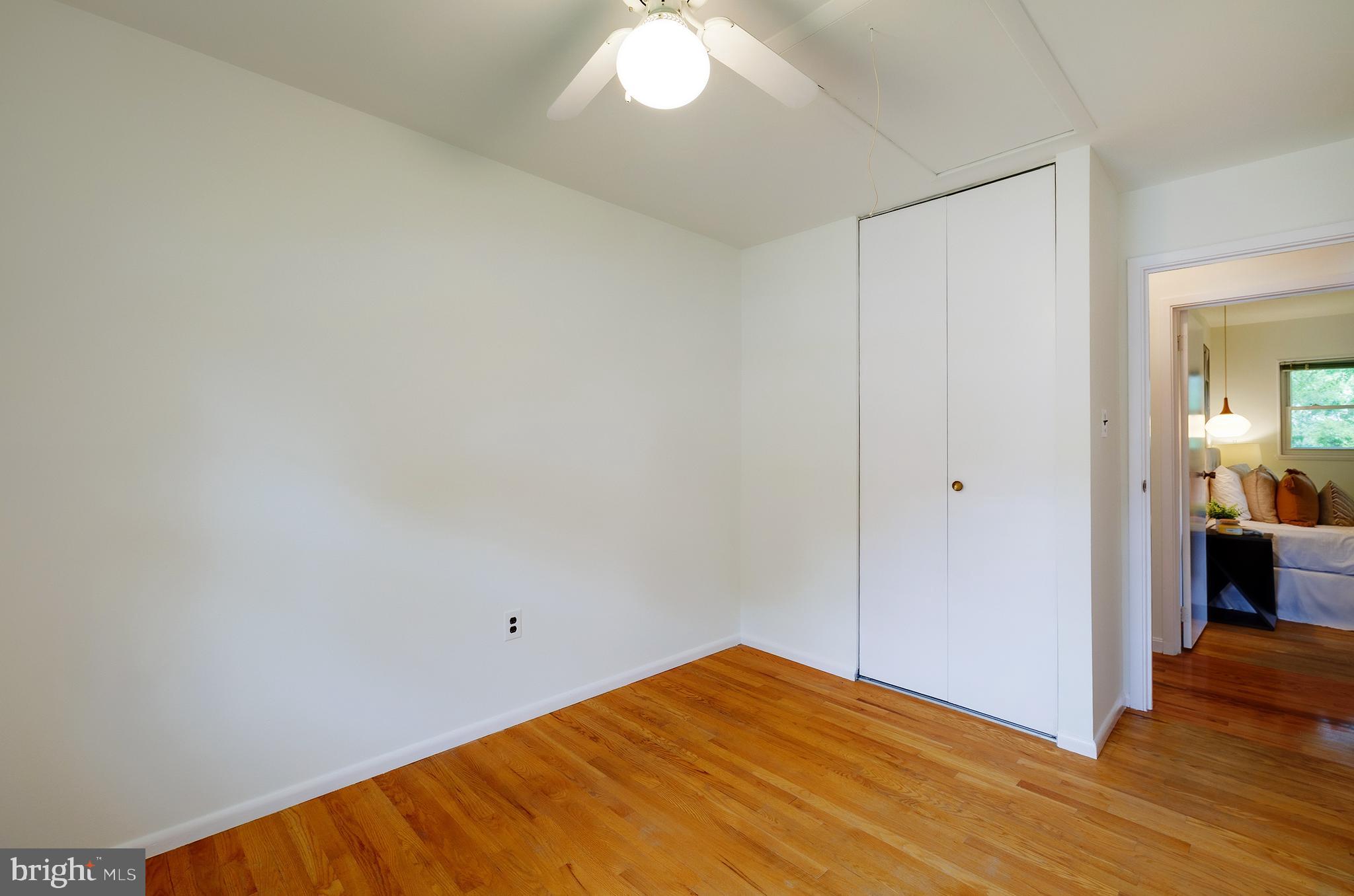 9212 Morley Road Lanham, MD 20706 - Photo 28 of 64 a view of empty room with wooden floor
