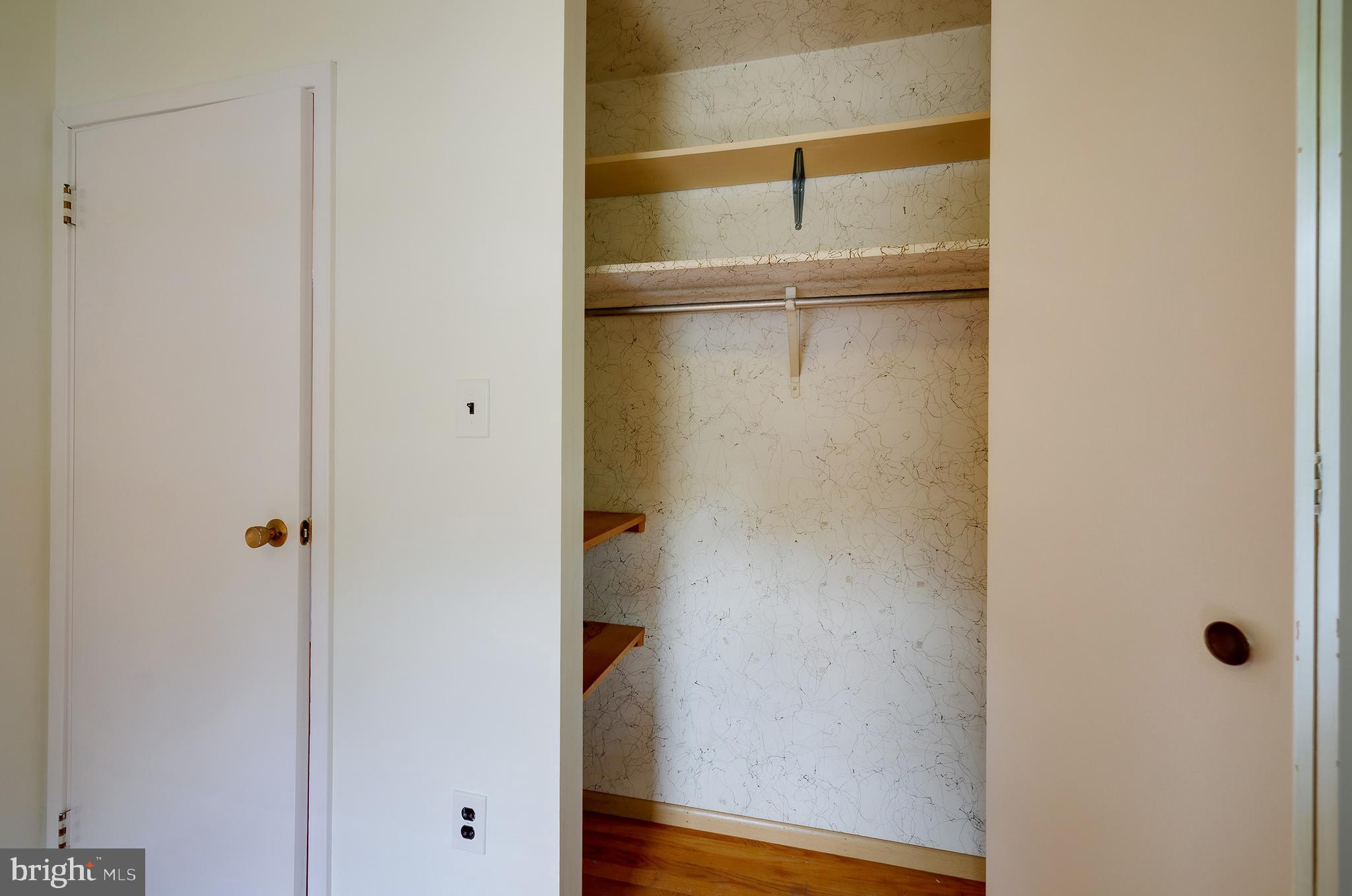 9212 Morley Road Lanham, MD 20706 - Photo 32 of 64 a view of an empty walk in closet