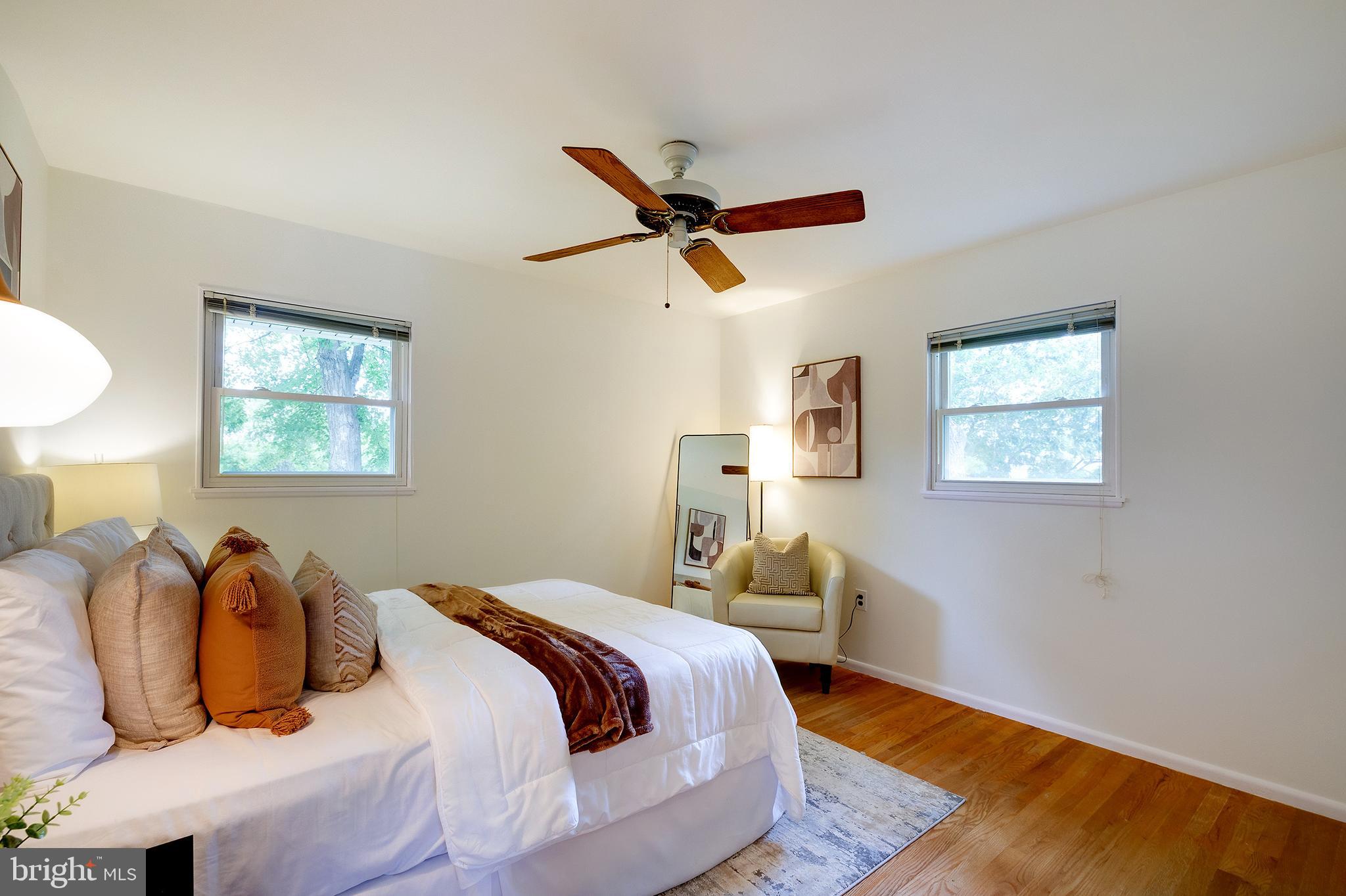 9212 Morley Road Lanham, MD 20706 - Photo 33 of 64 a bedroom with bed and a window