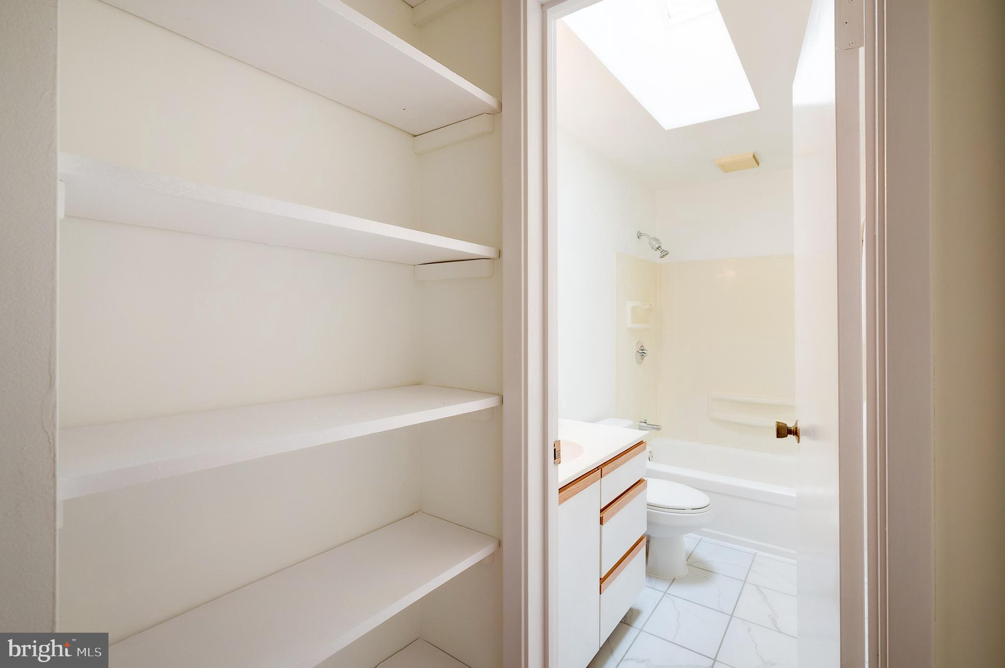9212 Morley Road Lanham, MD 20706 - Photo 36 of 64 a bathroom with a bathtub