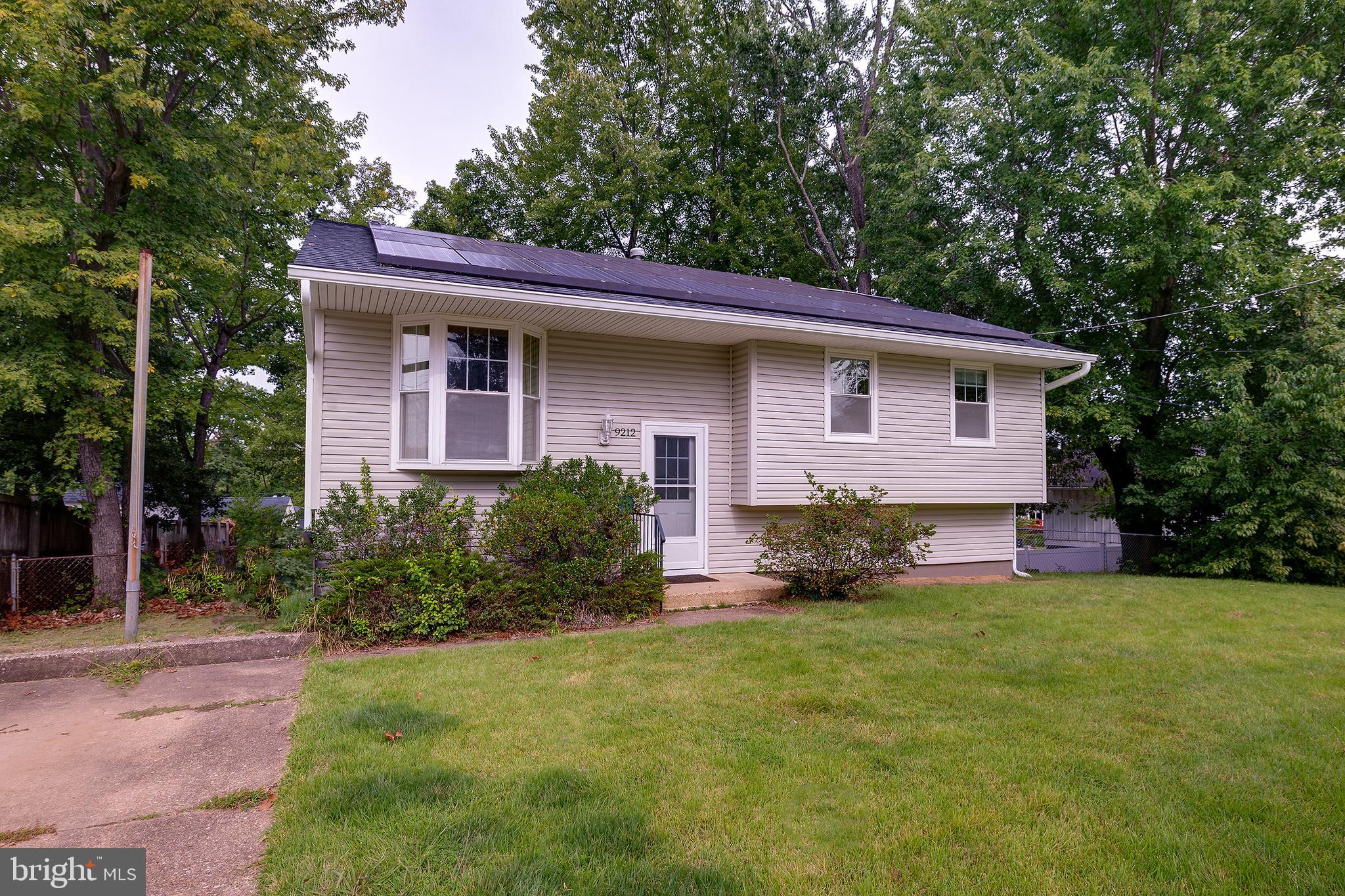 9212 Morley Road Lanham, MD 20706 - Photo 4 of 64 a front view of house with yard and green space