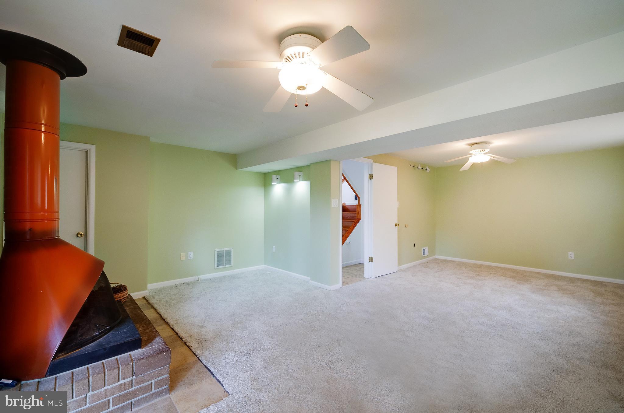 9212 Morley Road Lanham, MD 20706 - Photo 42 of 64 a view of a livingroom with a staircase