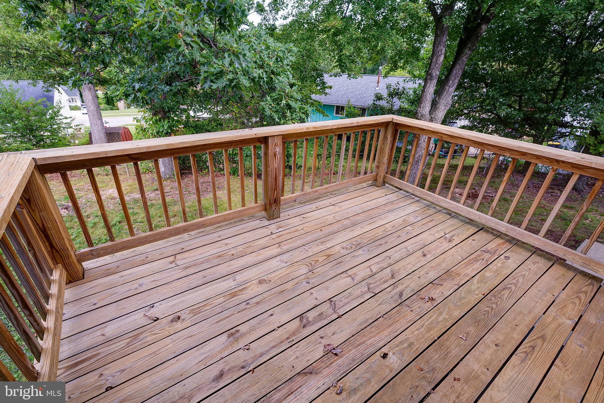 9212 Morley Road Lanham, MD 20706 - Photo 46 of 64 a view of balcony with wooden floor and fence