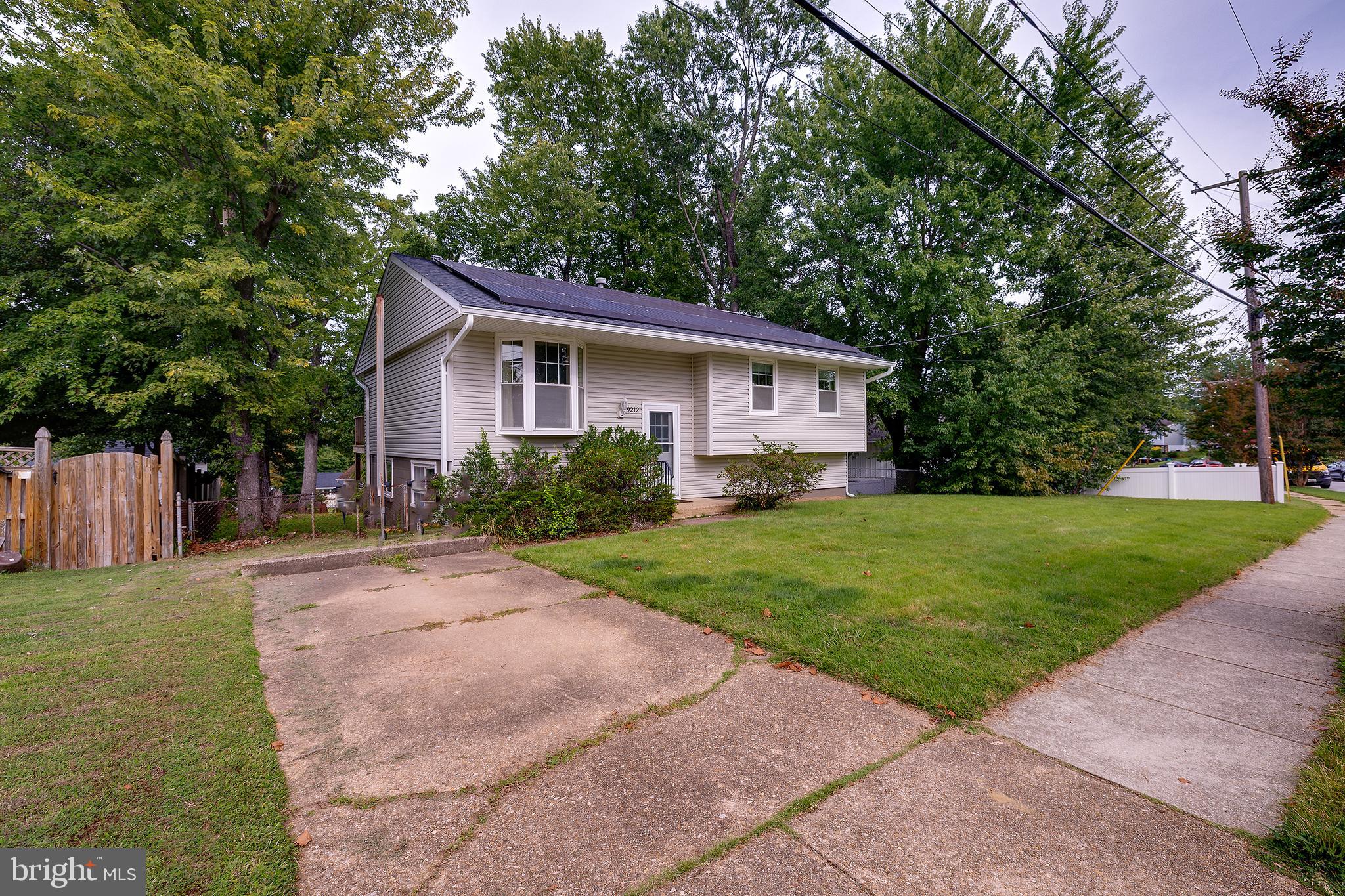 9212 Morley Road Lanham, MD 20706 - Photo 5 of 64 a front view of house with yard and green space