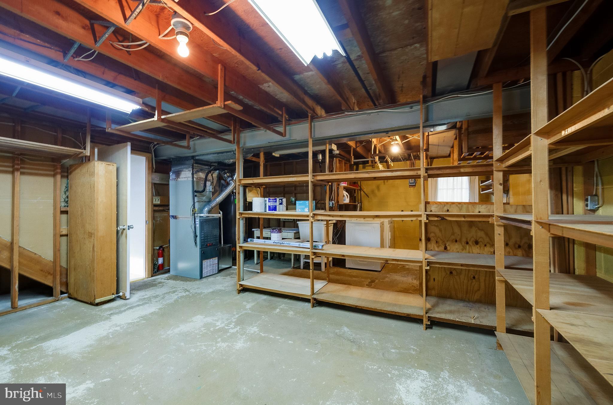 9212 Morley Road Lanham, MD 20706 - Photo 52 of 64 a view of an empty room with racks