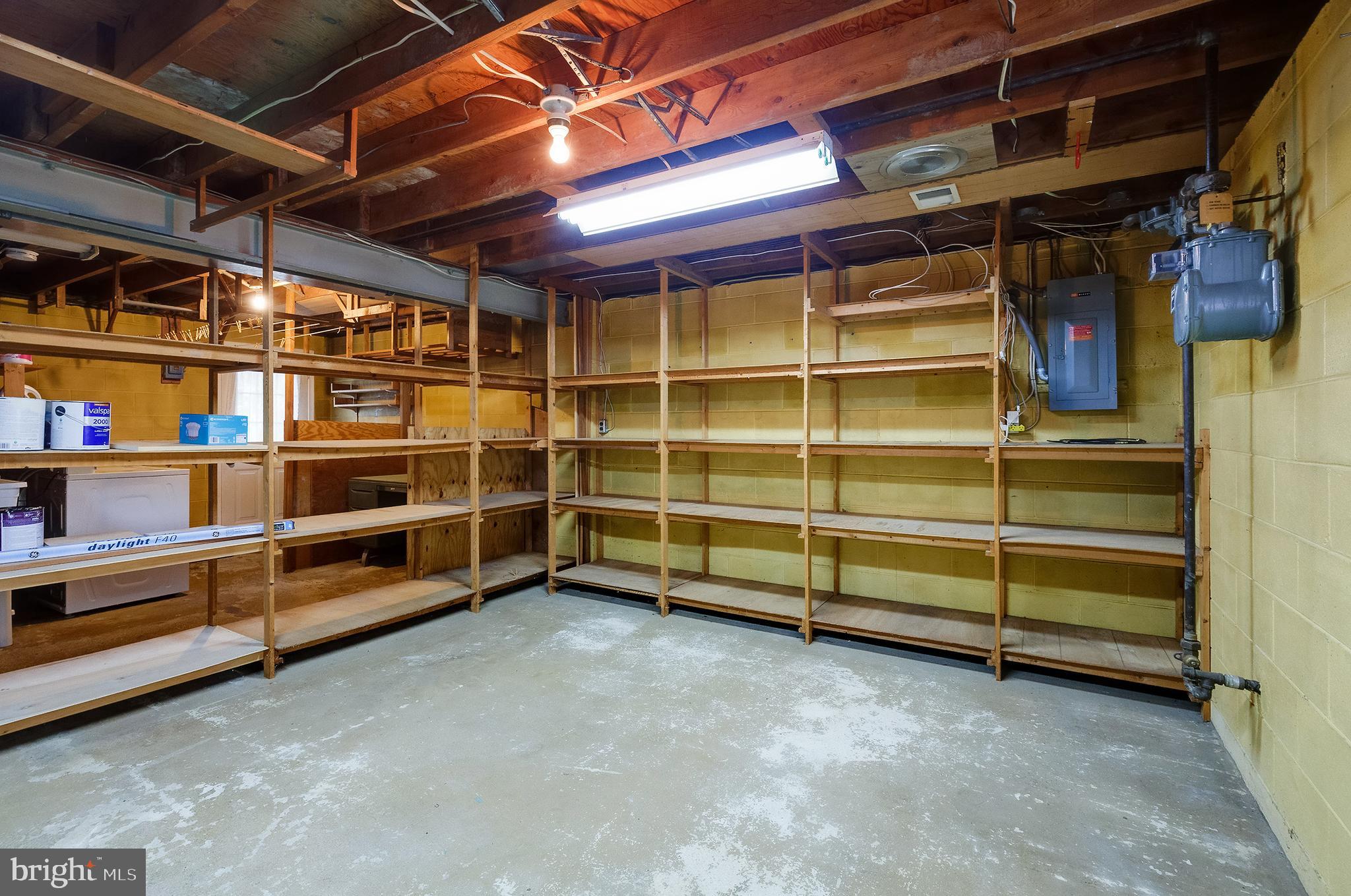 9212 Morley Road Lanham, MD 20706 - Photo 53 of 64 a view of an empty room with empty shelves