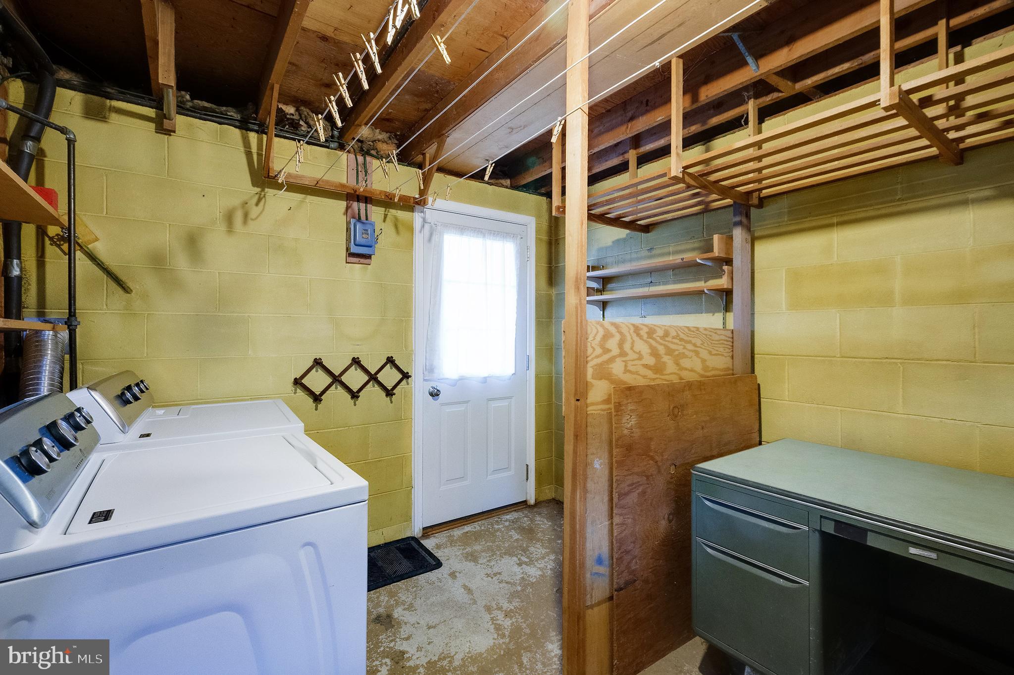 9212 Morley Road Lanham, MD 20706 - Photo 55 of 64 a bathroom with a sink and a shower