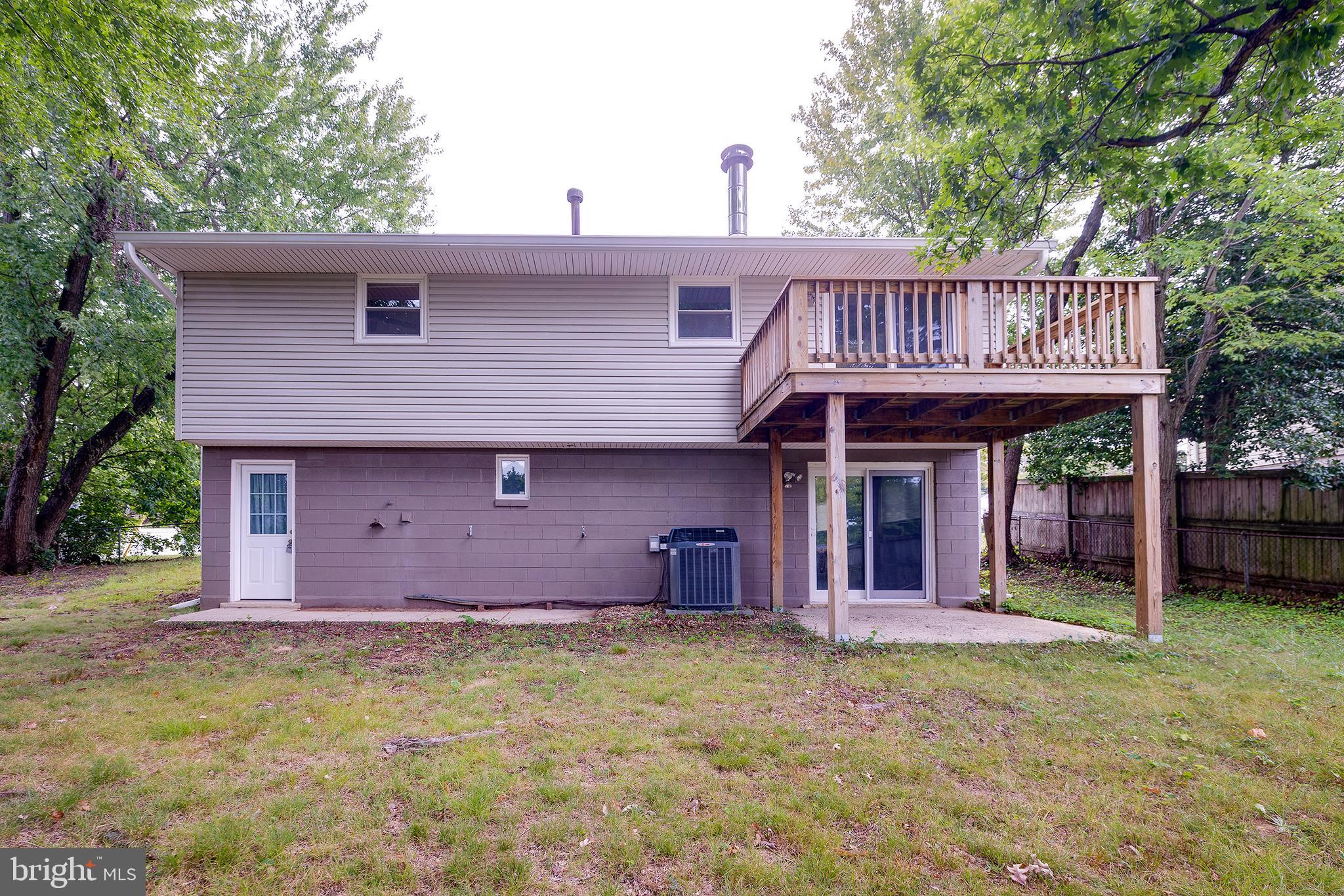9212 Morley Road Lanham, MD 20706 - Photo 60 of 64 front view of a house with a garden