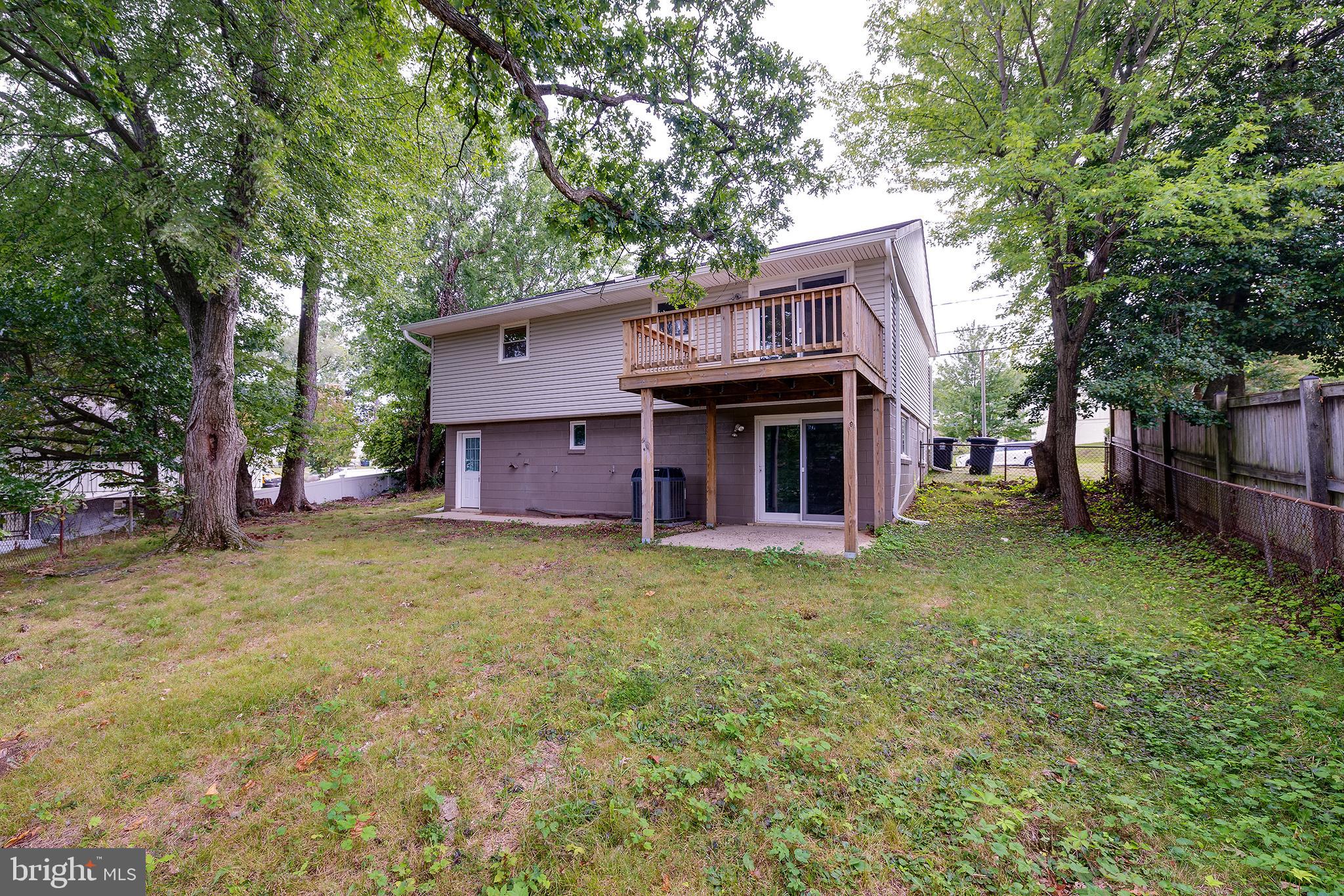 9212 Morley Road Lanham, MD 20706 - Photo 61 of 64 a view of a house with a yard