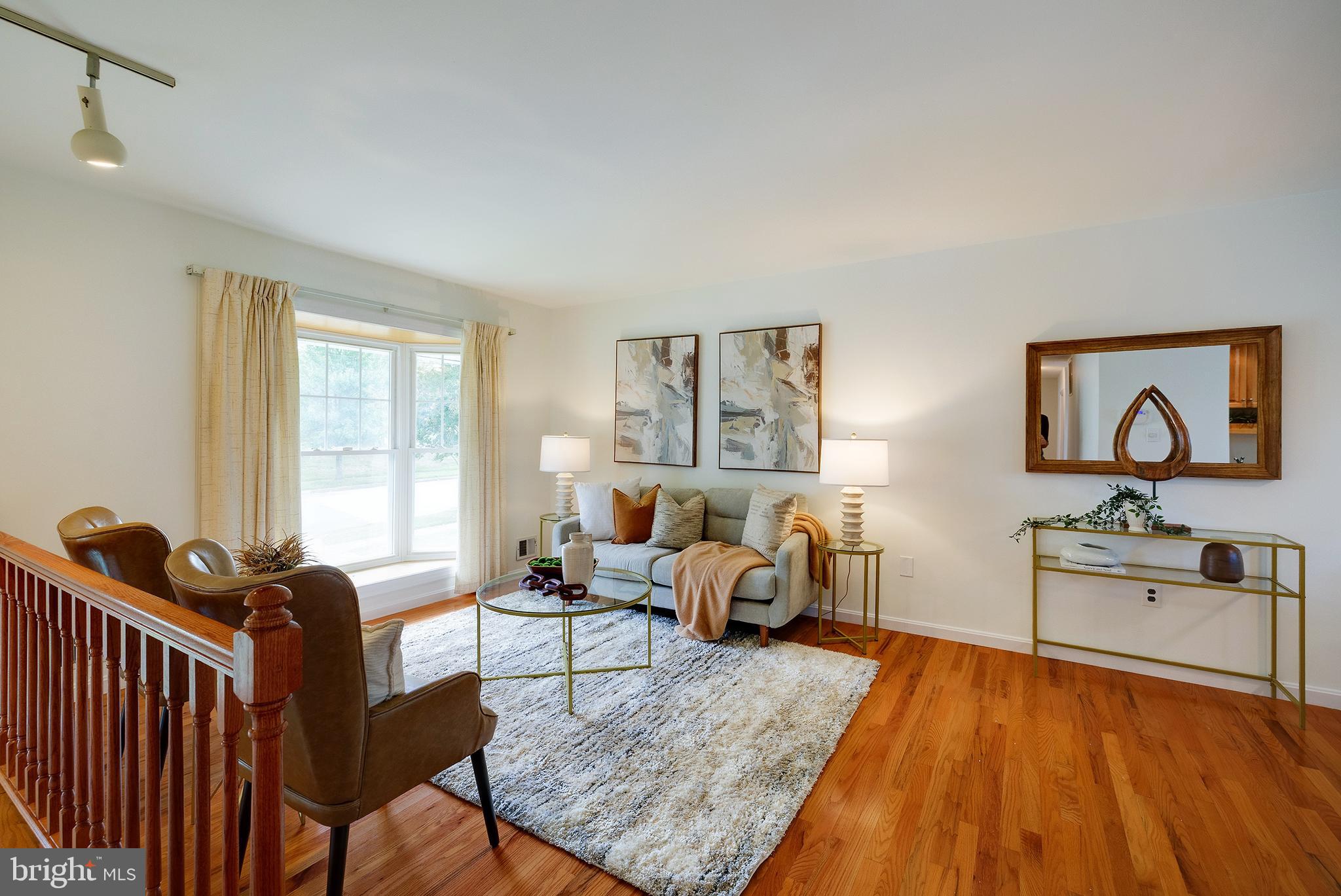 9212 Morley Road Lanham, MD 20706 - Photo 8 of 64 a living room with furniture and a wooden floor