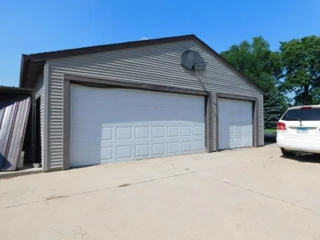 a house with trees in the background