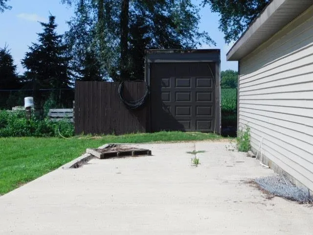 a street view with wooden fence