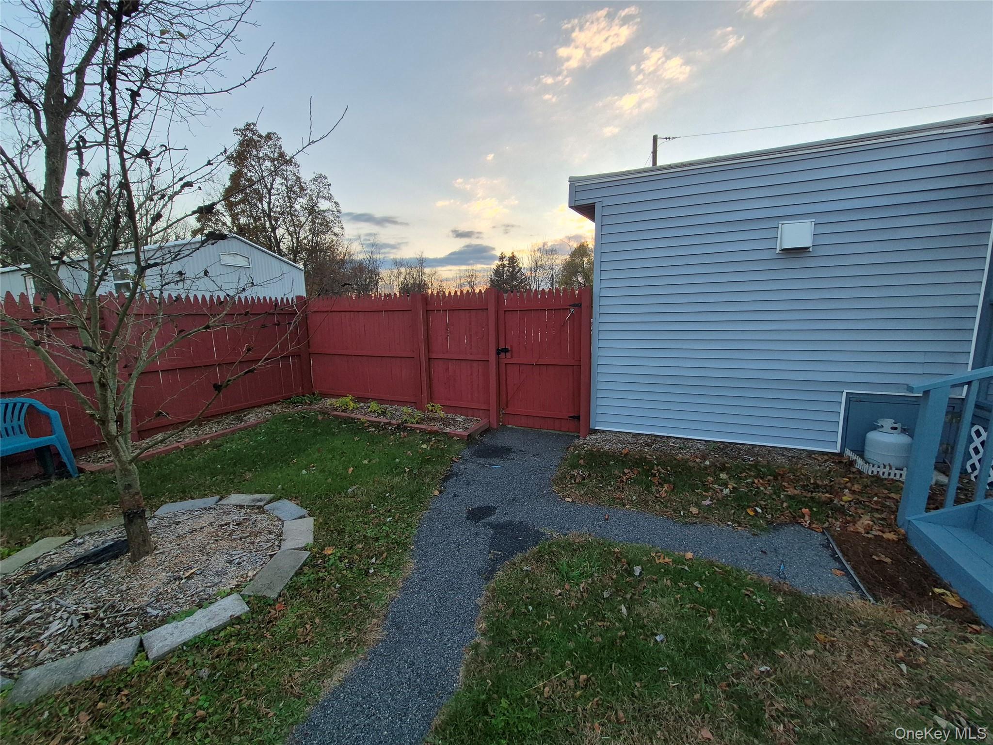 363 Mettacahonts Road, Unit 5 Accord, NY 12404 - Photo 32 of 39 a view of a backyard with pathway
