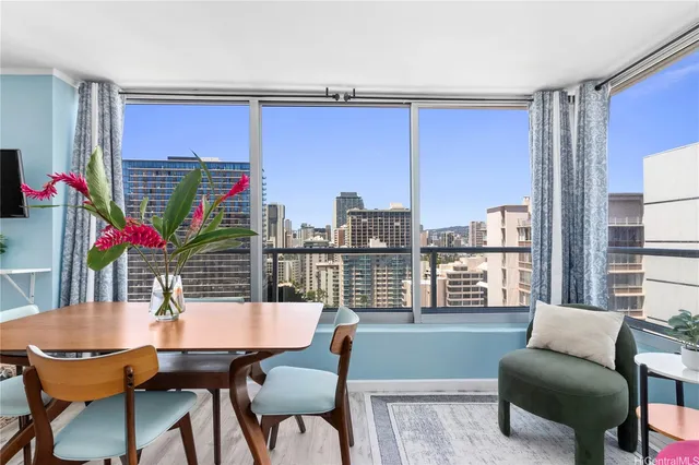 a view of a dining room with furniture window and outdoor kitchen
