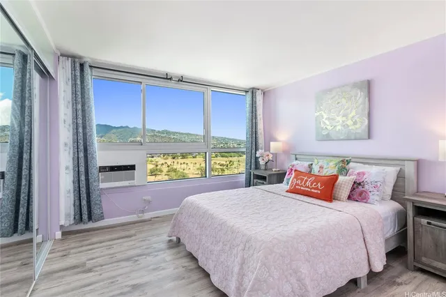 a view of a living room with a large window