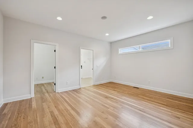 a bathroom with a double vanity sink mirror and