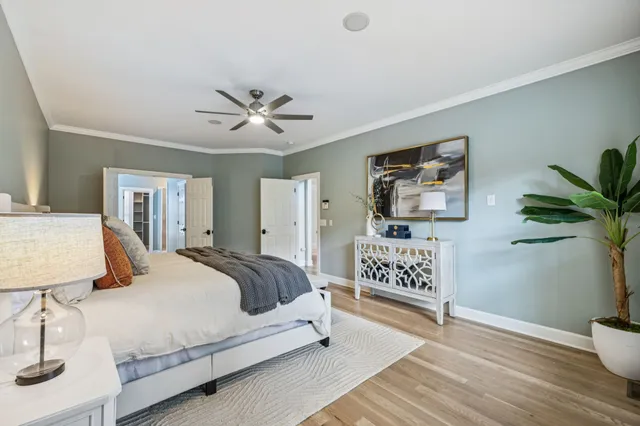 a view of an empty room with a ceiling fan